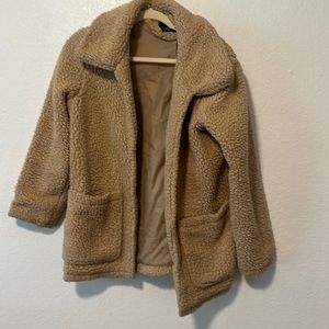 Beige fur coat